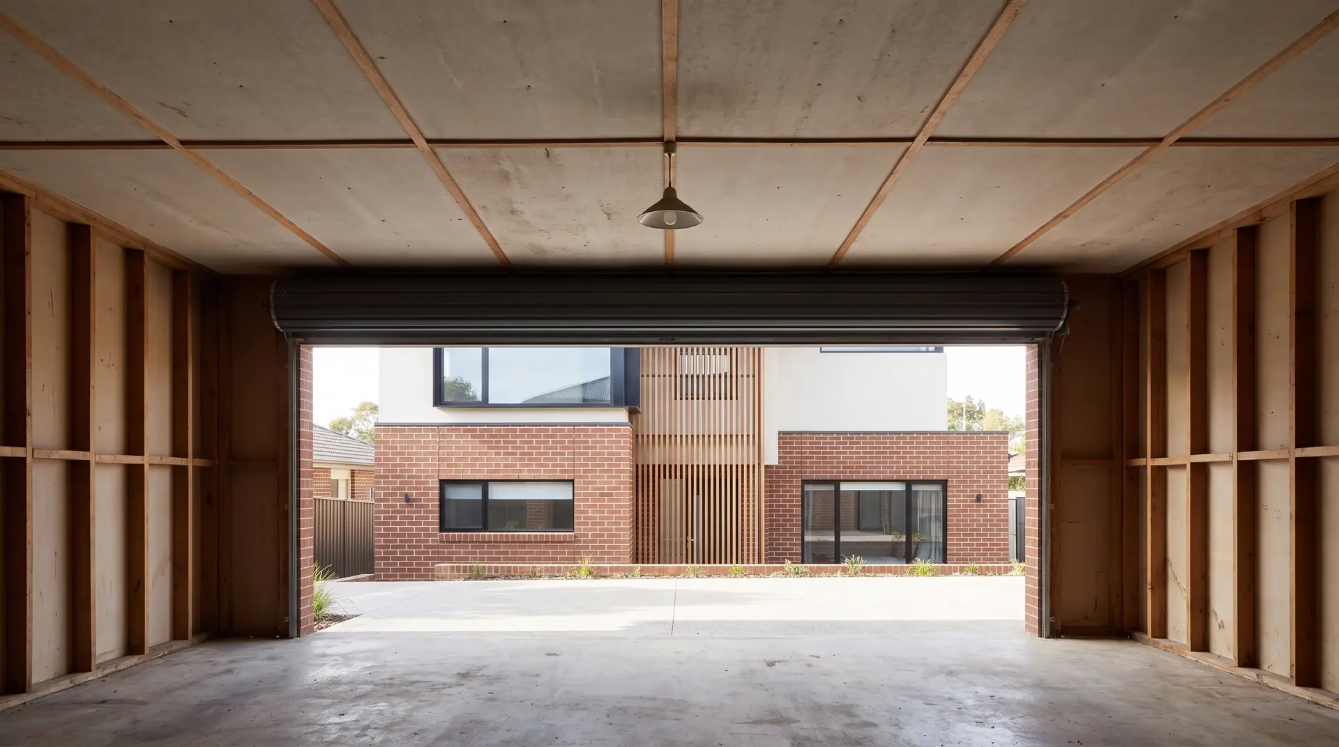 Illustration: a flat sheet ceiling with cover strips in an older garage, the sort of lining an asbestos inspection looks at
